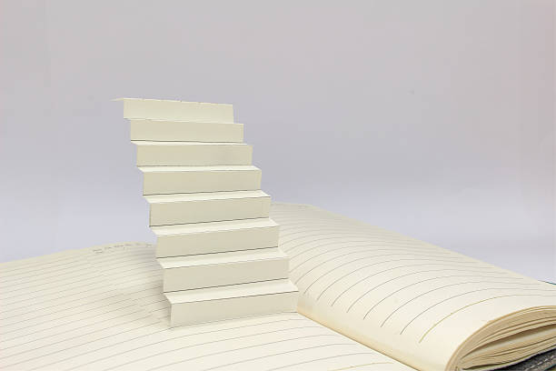 istock Ladder rise up from memo book 499092906