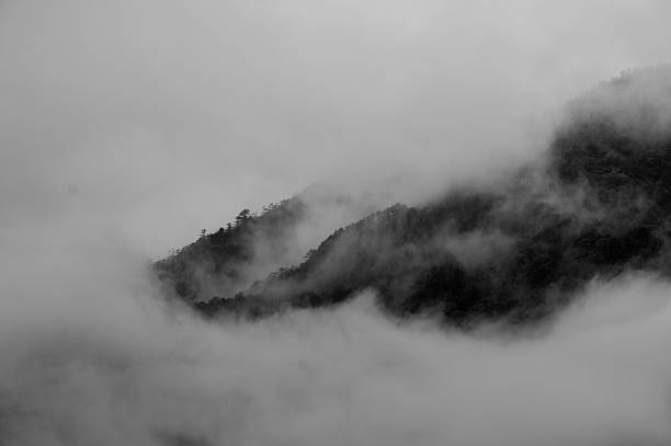 istock Blanket of fog cover Snowy Mountain Range 499093077