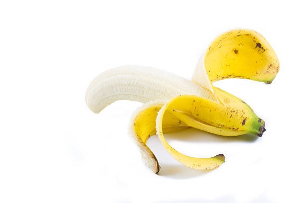 istock Peeled banana on white background 499093136