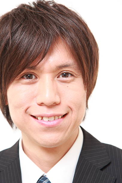istock Japanese businessman smiles 499094079