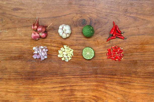 Ingredients for Thai food on wood table with space