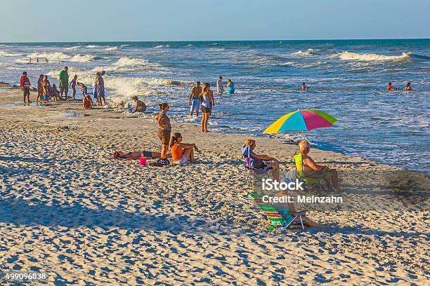 People Enjoy The Beautiful Beach In St Augustine Stock Photo - Download Image Now - Beach, St. Augustine - Florida, 2015