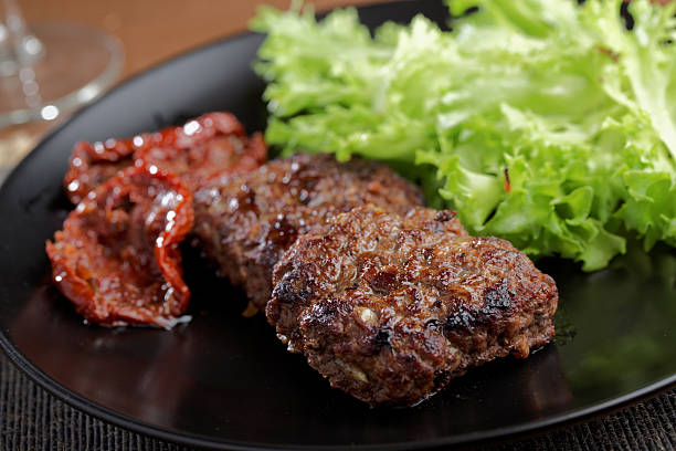 istock Meat burgers with vegetables 499097350