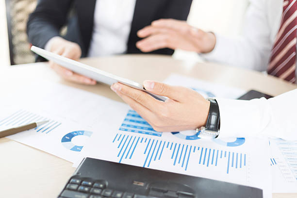 istock Modern people doing business, graphs and charts being demonstrat 499097695