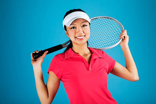 istock Asian Female Tennis Player on Blue 499097887