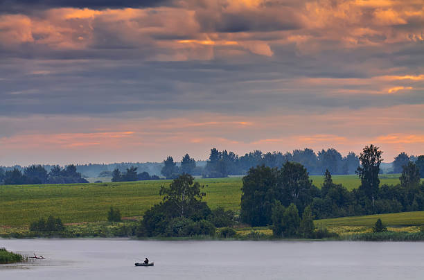 istock The lonely boat with the fisherman 499099131