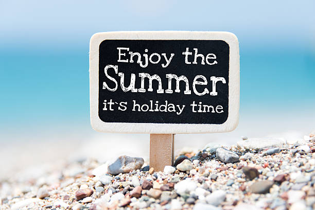istock Enjoy the summer handwritten on blackboard 499099723