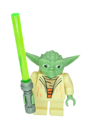 Adelaide, Australia - June 15, 2014: A studio shot of a Yoda Lego Compatible minifigure from the movie series Star Wars. Lego is extremely popular worldwide with children and collectors.