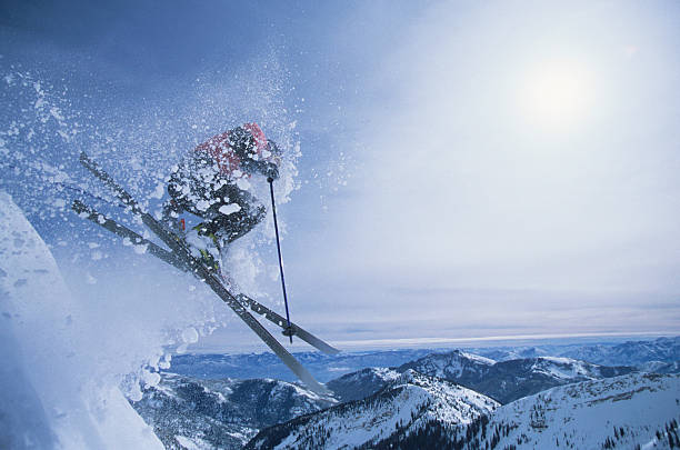 istock Person On Skis Jumping Over Slope 499108243