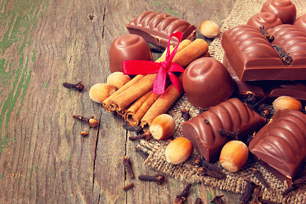 istock chocolate candies, cinnamon, nuts close up 499109061
