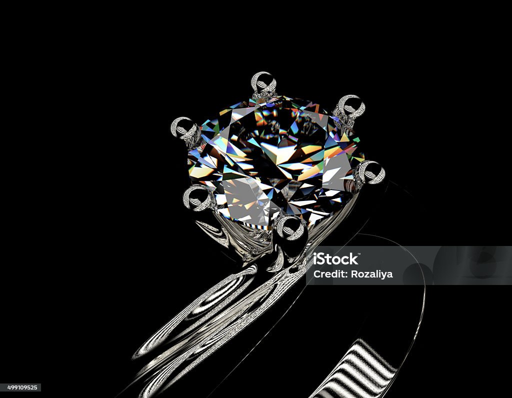 Golden Engagement Ring with Diamond or moissanite. Jewelry backg Golden Engagement Ring with Diamond or moissanite on black background. Jewelry background Artificial Stock Photo