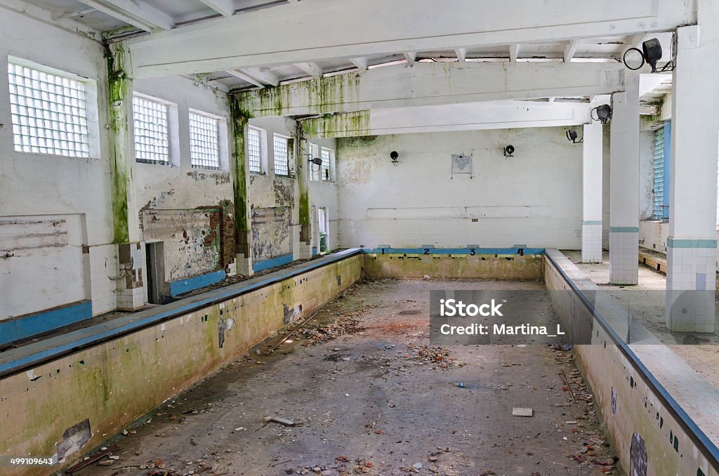 Abandoned swimming pool Old ruined abandoned empty public swimming pool Abandoned Stock Photo