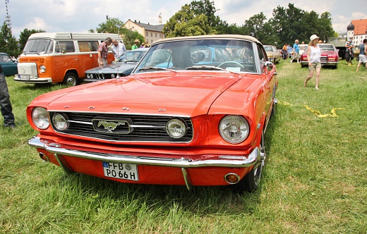 Bad Aibling, Germany - June 19, 2014: Ford Mustang on Bavaria Historic meeting in Bad Aibling / Bavaria. Here is organized every year a vintage car rally. The car is built 1962. The visitors marvel at the beautiful cars.