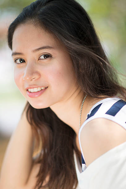 istock Young woman smile 499110469