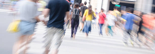 People walking on big city street stock photo