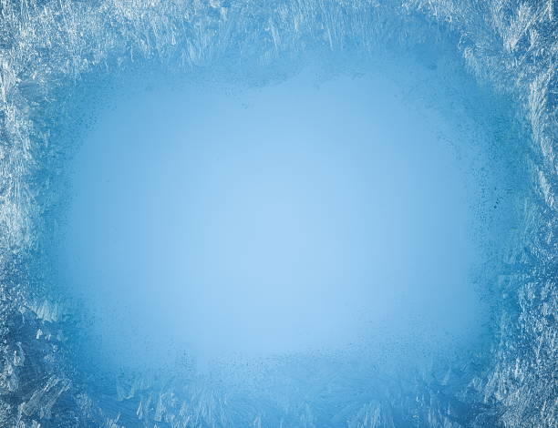 istock Frosty patterns on the edge of a frozen window. 499120542