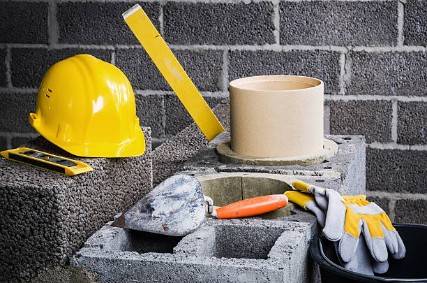 istock Construction of modular ceramic chimney in the house 499122288