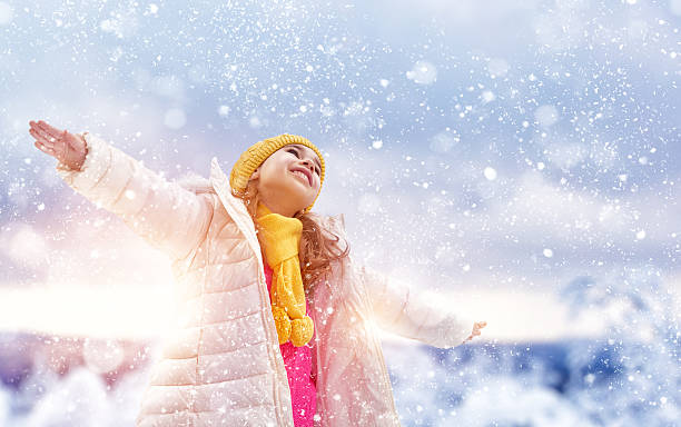 istock girl playing on a winter walk 499122802