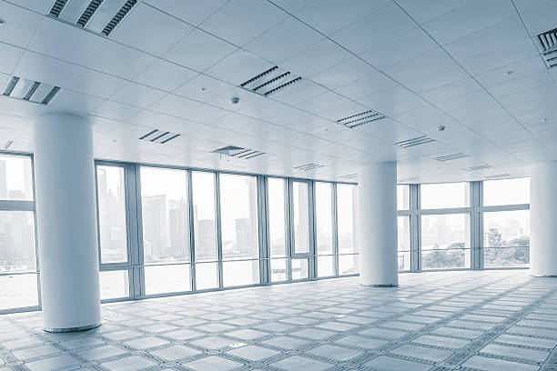 istock empty office room in modern office buildings 499123118