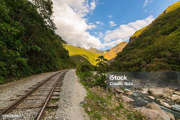 Railway Track And Machu Picchu Mountains Peru Stock Photo - Download Image Now - 2015, Adventure, Ancient Civilization