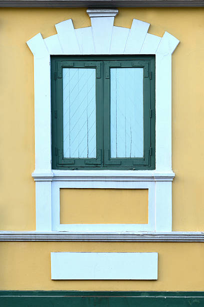 istock Window of building on orange background, Classic style. 499123569