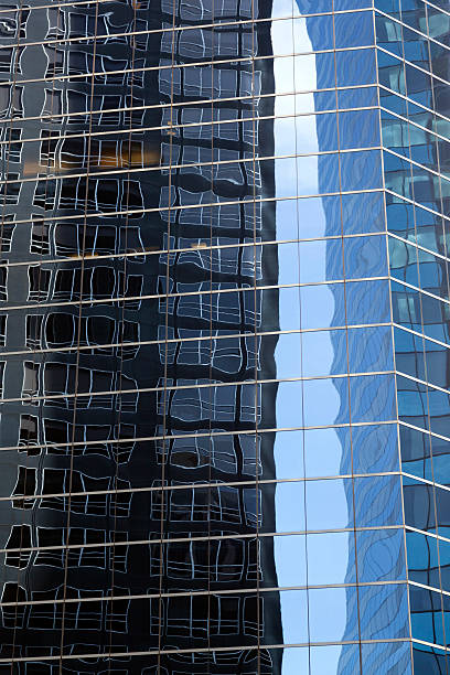 istock abstract image of modern office building facade with reflections 499123636