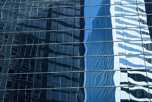 istock abstract image of modern office building facade with reflections 499123688