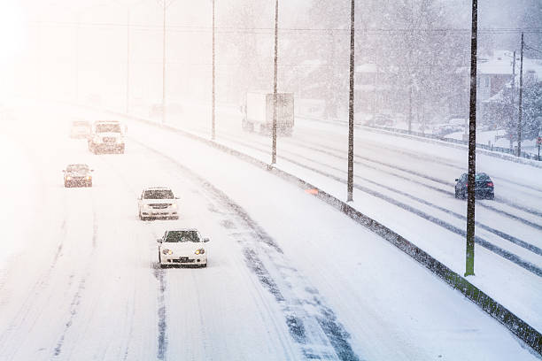 istock Disturbing Sunset Light and Snowstorm on Highway 499124153