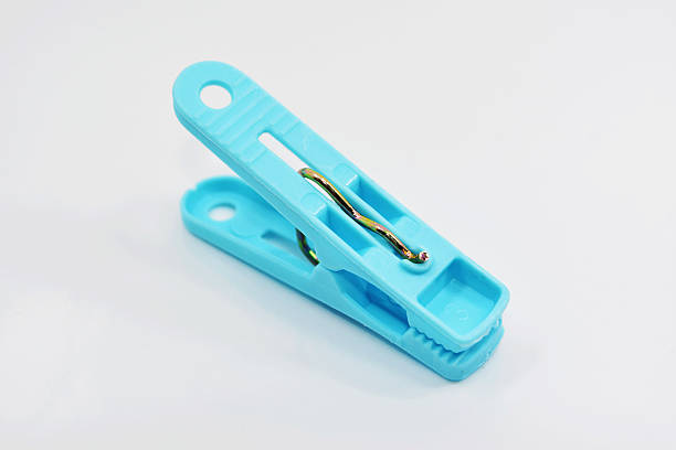 istock Plastic blue clothespins isolated on white background. 499125439
