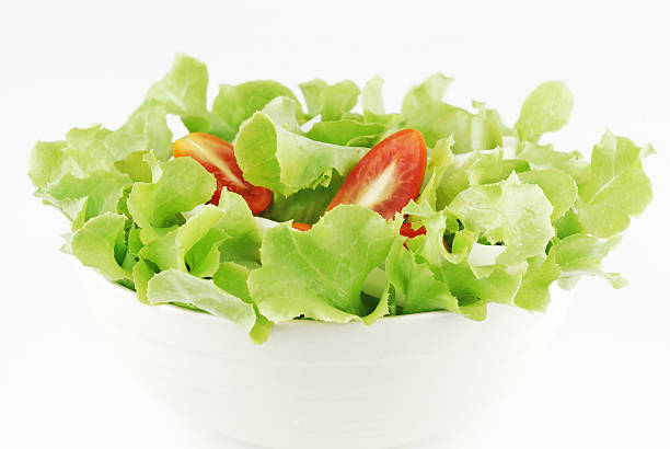 istock vegetable salad bowl on white background 499125629