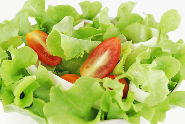 istock vegetable salad bowl on white background 499125635