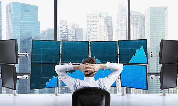 istock man with hands locked on back of the head sitting 499126242