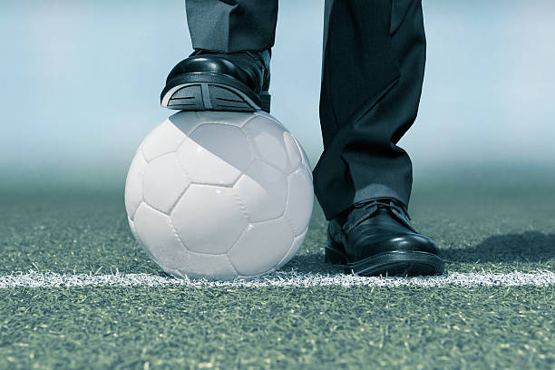 Businessman with a soccer ball
