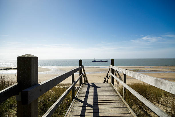 The ship are going to or coming from the Dutch Harbor Vlissingen and passing by close to the Beach.
