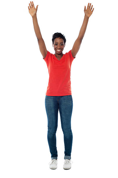 istock Excited woman raising her arms up 499128947