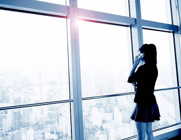 istock Businesswoman on mobile phone 499129582