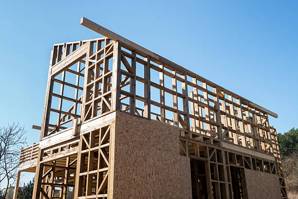 istock Wooden frame of a new house under construction 499129716