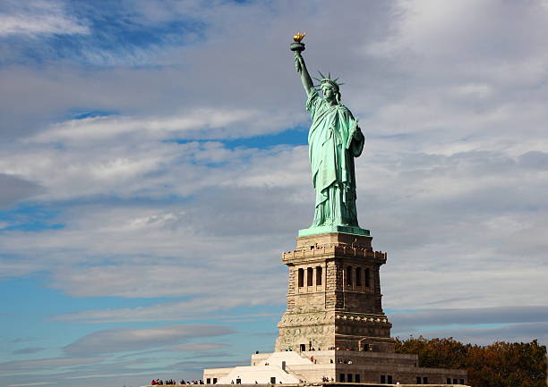 istock Statue of Liberty with Clouds Horisontal Right View 499130990