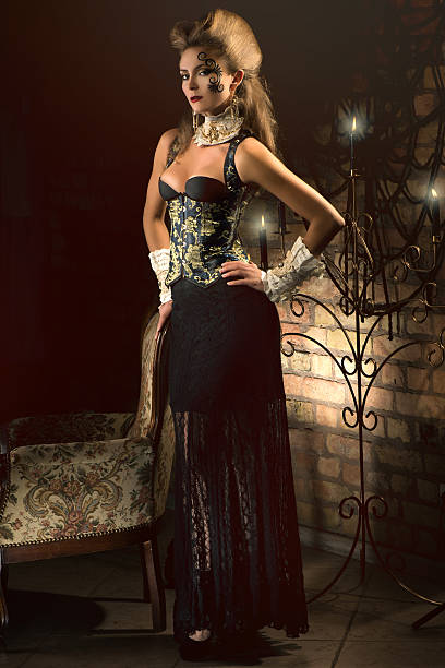 istock young woman wearing corset dress 499132014