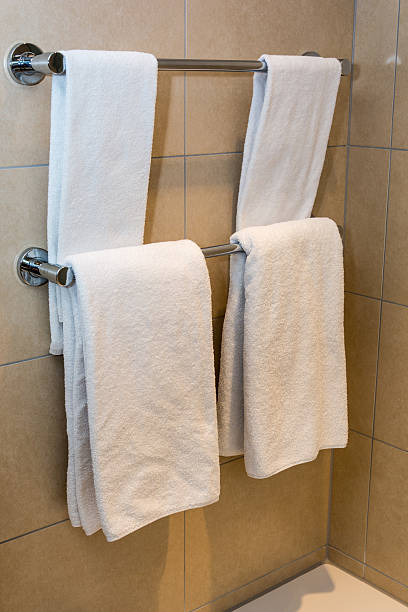 istock white towels on a hanger prepared to use 499132920