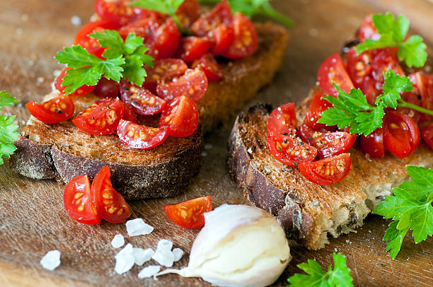 istock Italian bruschetta with cherry tomatoes on whole grain bread 499134316