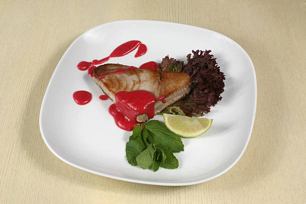 istock pork in tomato sauce with lemon and herbs 499145108