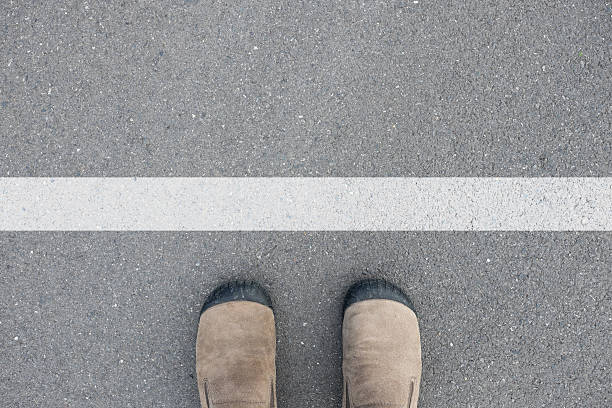 istock Shoes standing at the white line 499145500