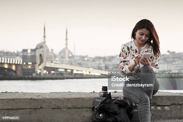 Pretty Woman Using Smart Phone In Istanbulturkey Stock Photo - Download Image Now - Türkiye - Country, Asia, Tourism