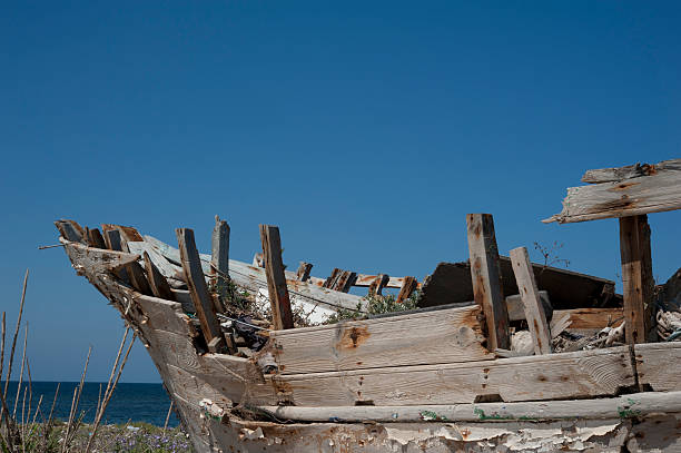 istock Old wooden ship hull, Marsala Harbour, Sicily, Italy. 499148810