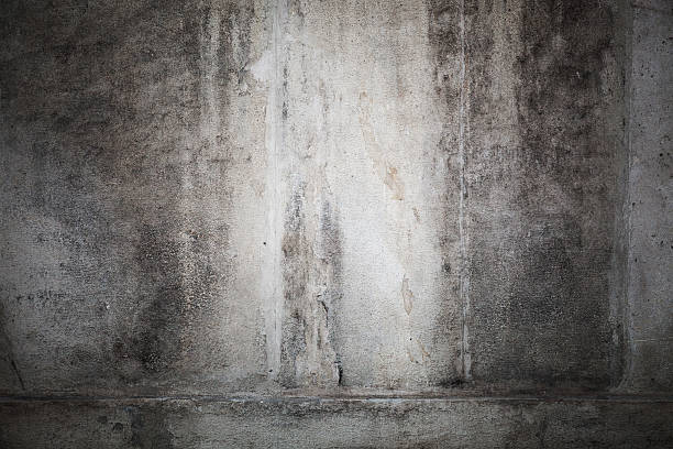istock Dark concrete wall with vignette photo effect 499149372
