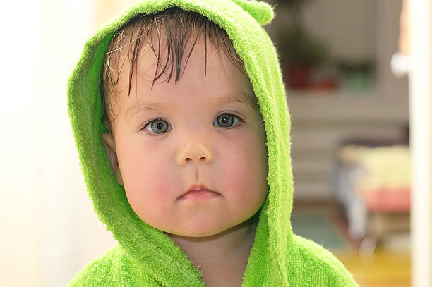istock Baby after bath portarit in bathrobe 499149376