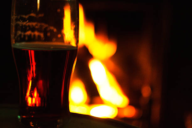 istock Pint of ale and fire 499149398