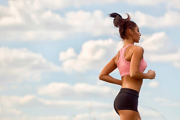 istock Slim woman running 499152842
