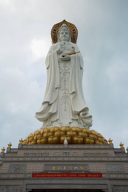 istock Guan Yin white marble statue in China 499153326
